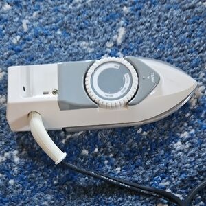 Compact White and Gray Travel Iron
